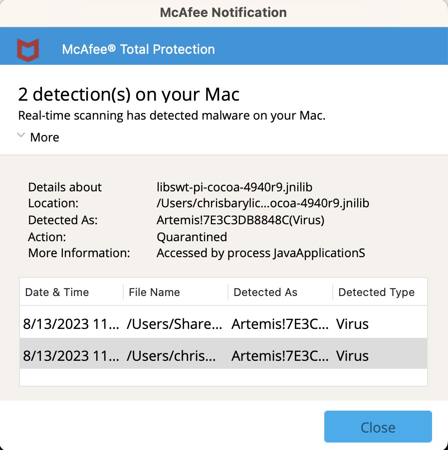 McAfee Total Protection locates two suspect files during a background scan
